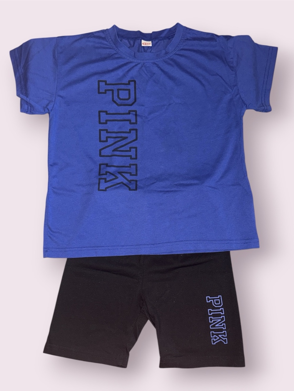 Girls athletic outfit with PINK logo